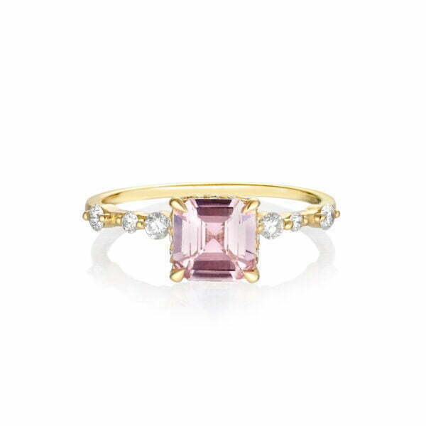 Pink sapphire ring with diamonds set in 18K yellow gold