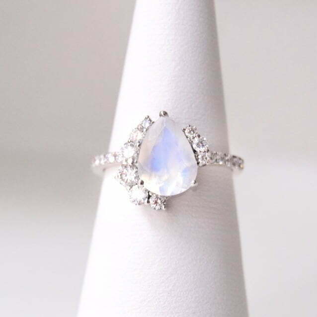 Moonstone ring with diamonds in 18K white gold