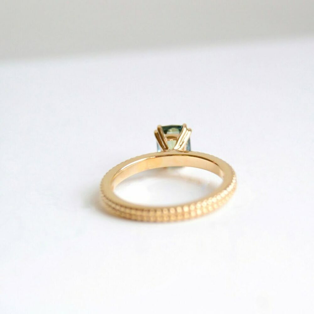 Green sapphire ring with miligrain band