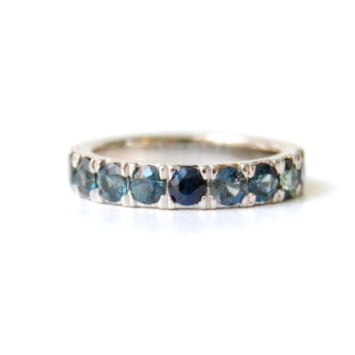 teal sapphire ring made of platinum