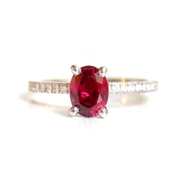 ruby ring with diamonds set in 18k white gold