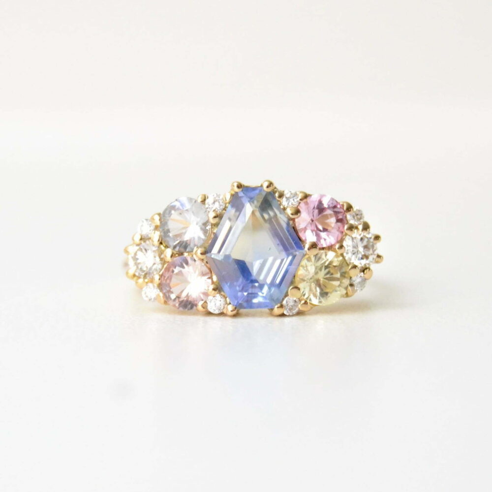 Kite cluster ring with sapphires and diamonds set in 18K yellow gold