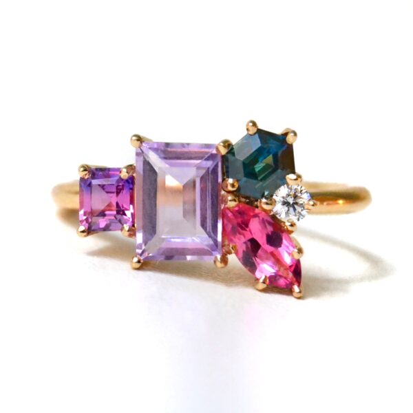 Heirloom gemstone cluster ring with amethyst, sapphires and diamond set in 18k yellow gold.