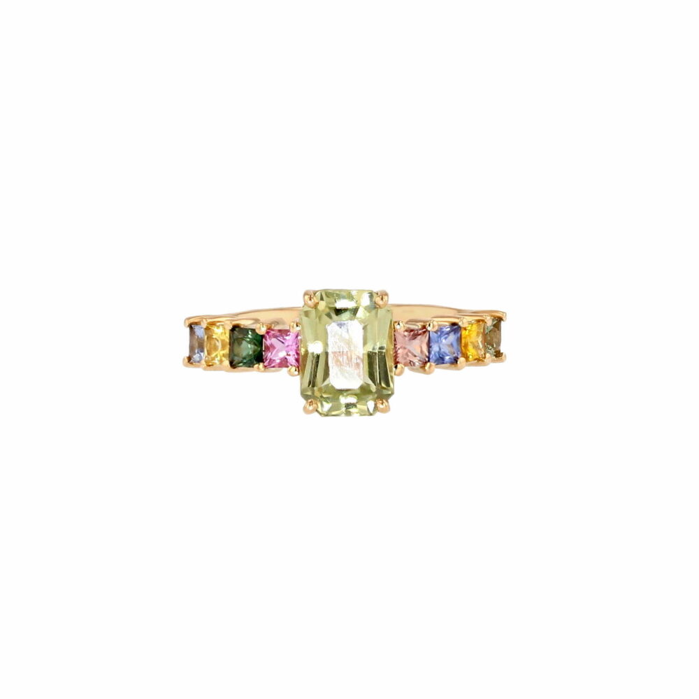 Radiant cut tourmaline ring with princess cut sapphires
