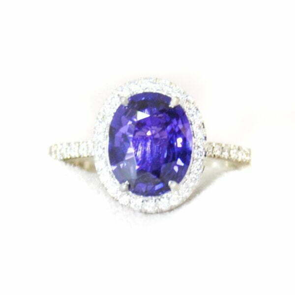 Color changing sapphire ring with diamonds