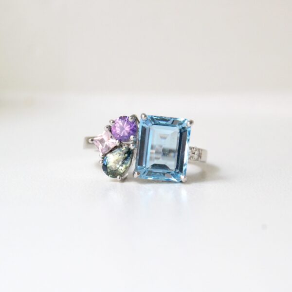 Aquamarine ring with sapphires and diamonds set in 18K white gold