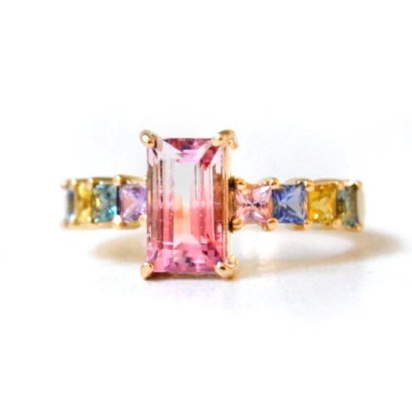 Bi-color tourmaline ring With sapphires set in 18k yellow gold