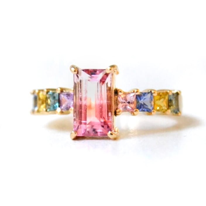 Bi-color tourmaline ring With sapphires set in 18k yellow gold
