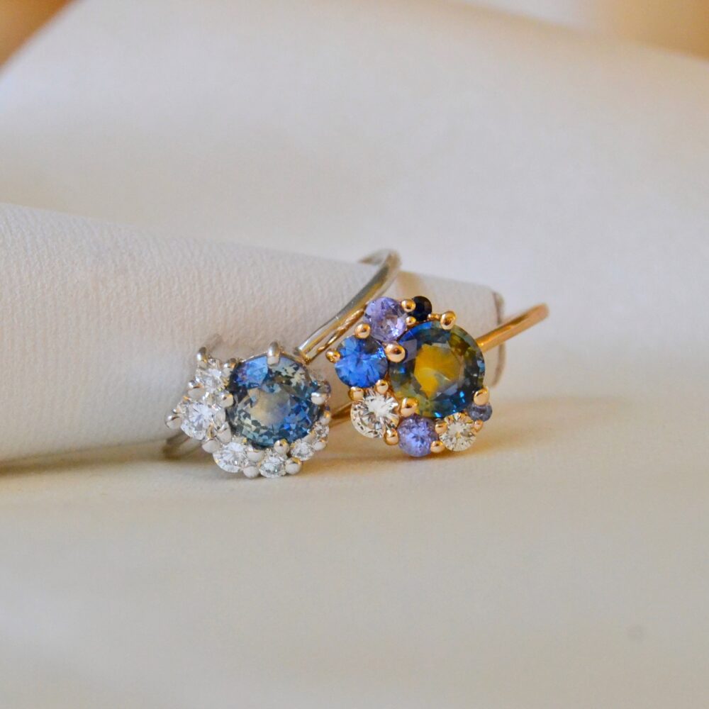 Colorful asymmetric halo ring with bi-color sapphire