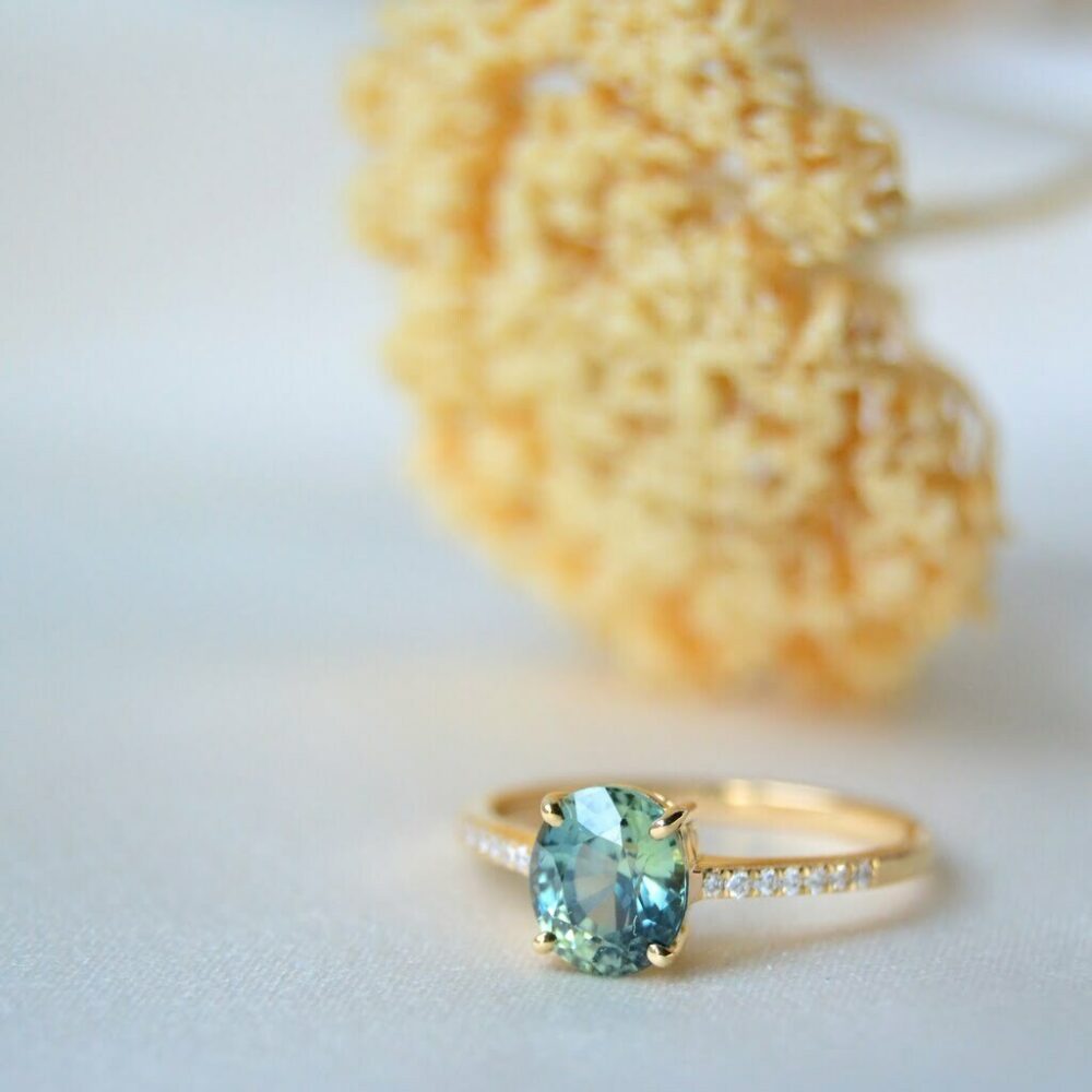 Green sapphire ring with diamonds