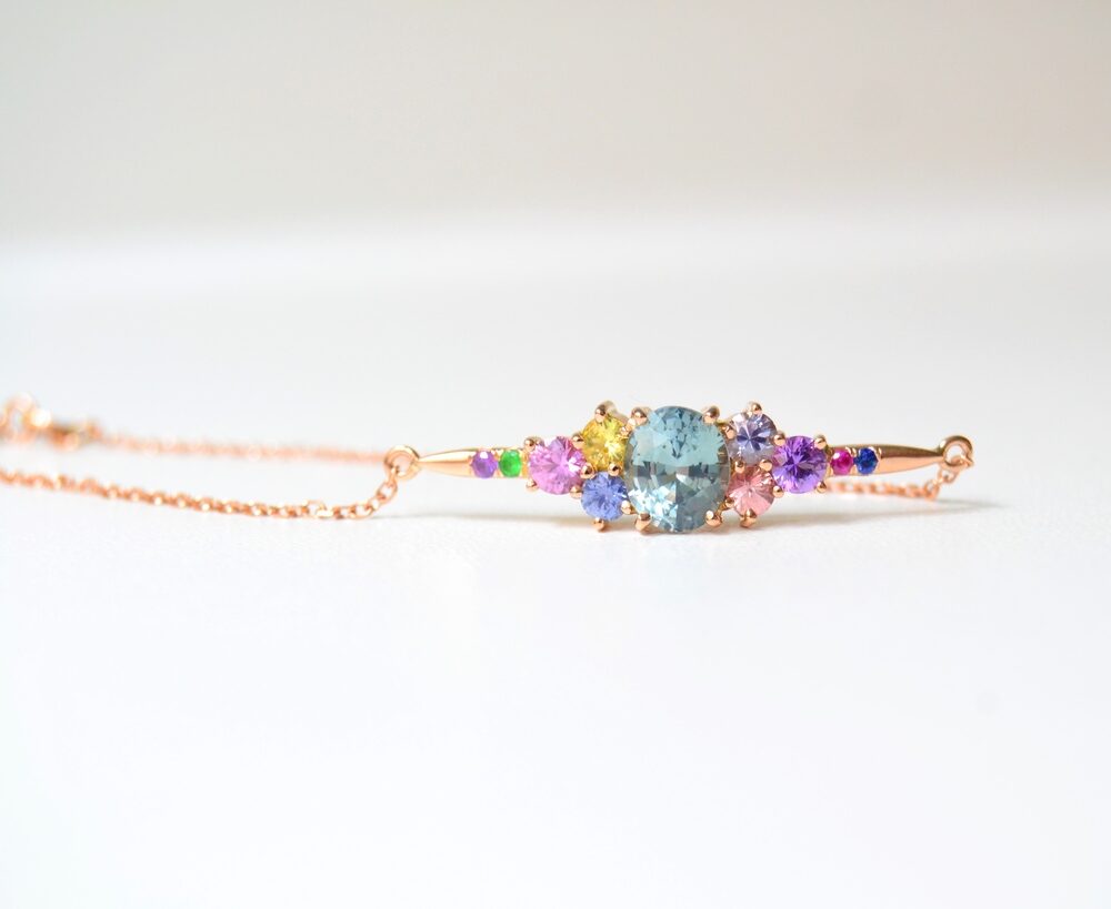 Cluster bracelet with pastel sapphires set in 18K rose gold.