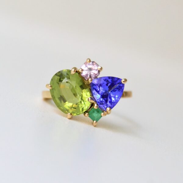 Birthstone ring in a cluster design of 18k yellow gold