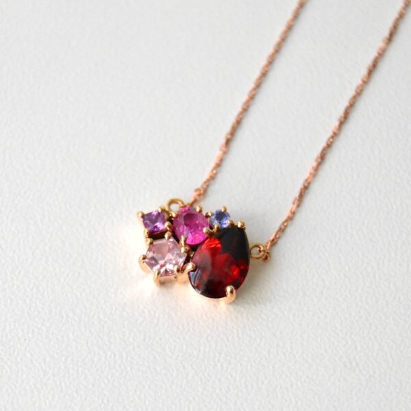 Garnet necklace with sapphires set in 18K rose gold