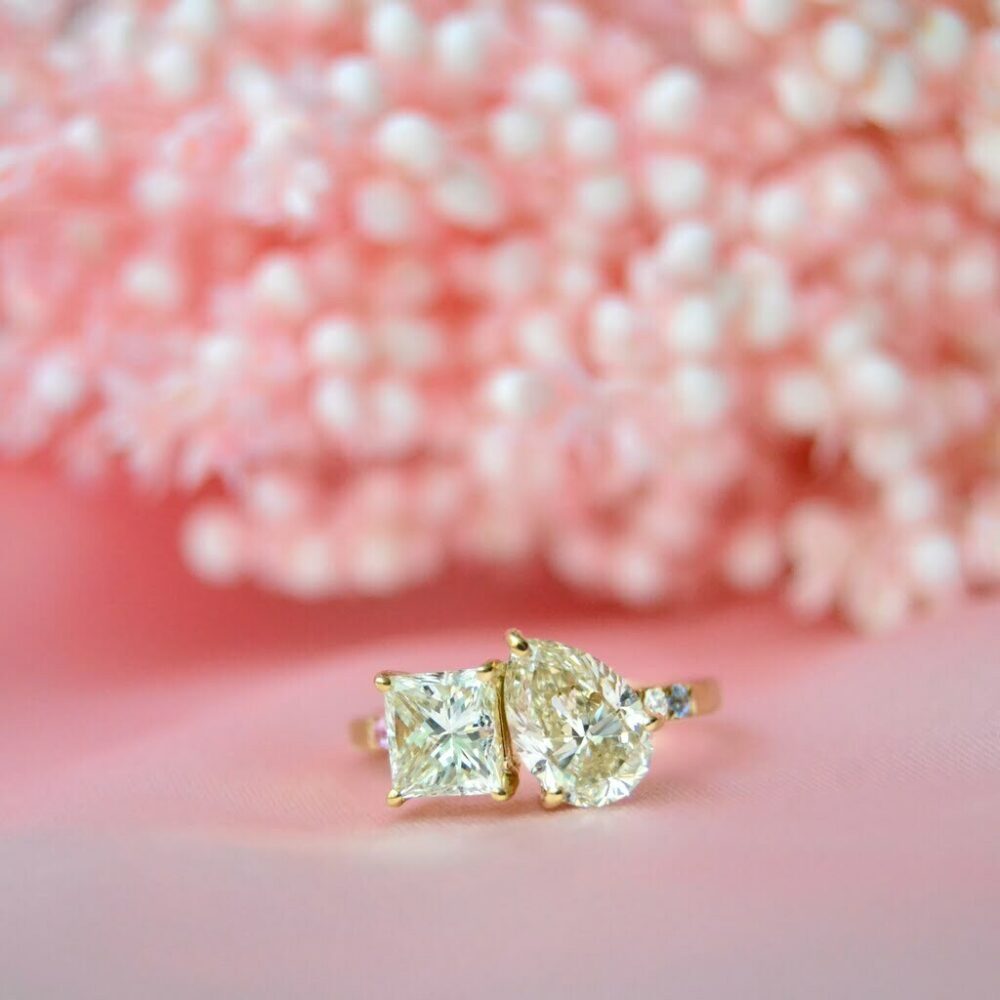 Diamond toi et moi ring with pear shaped and radiant cut diamond added a pop of color