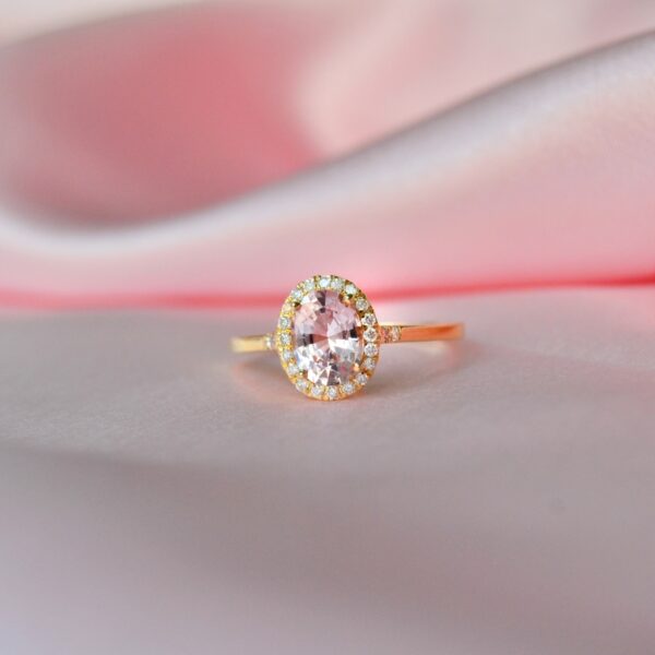 Pink sapphire halo ring