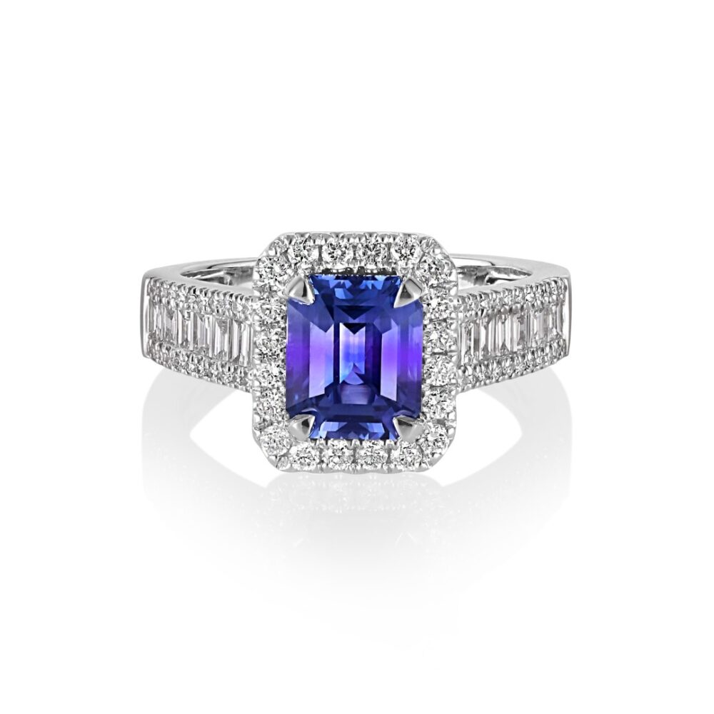 Color changing sapphire ring set with baguette VS1 diamonds in 18K white gold