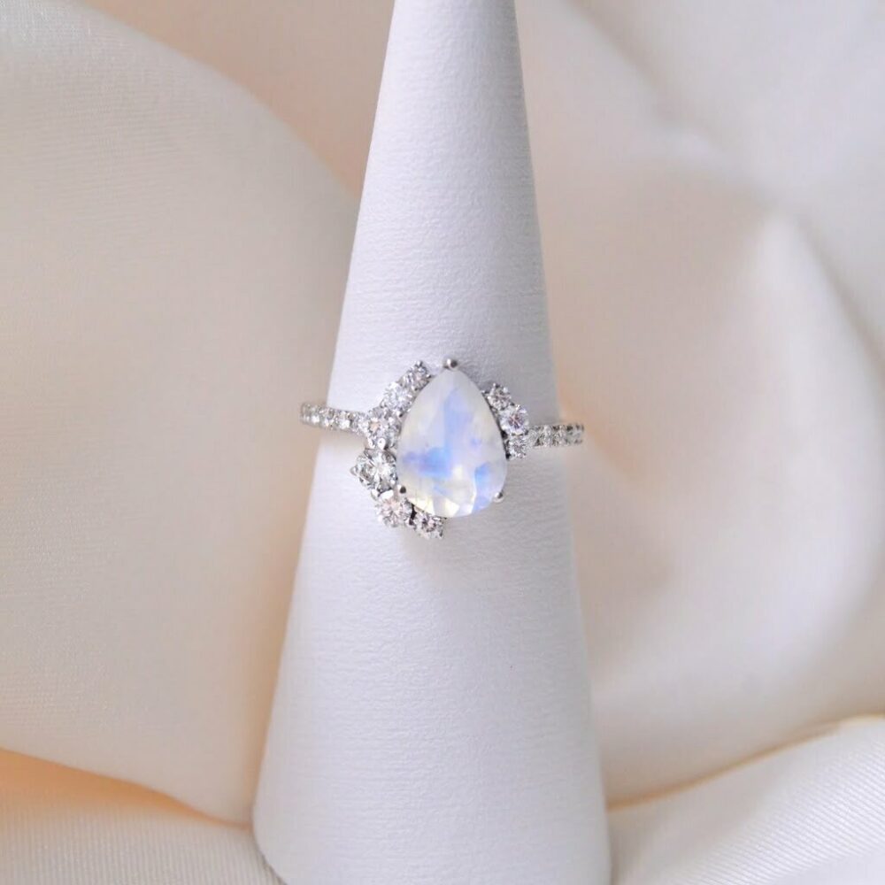 Moonstone ring with diamonds set in 18K white gold
