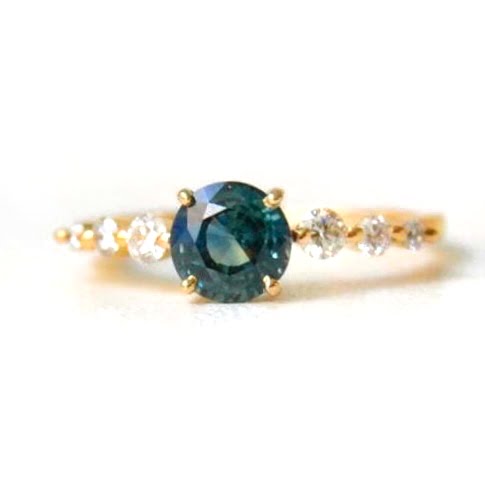 Teal sapphire ring with diamonds