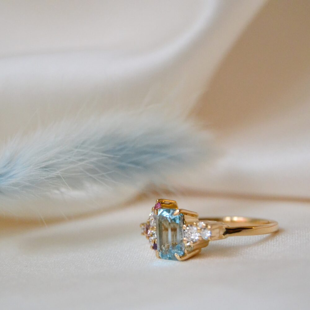 Aquamarine ring with diamonds and sapphires