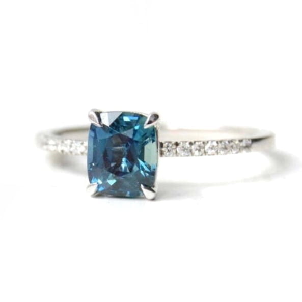 Teal sapphire ring with diamonds