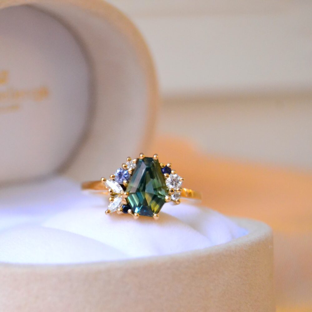 Fancy cut sapphire cluster ring with diamonds