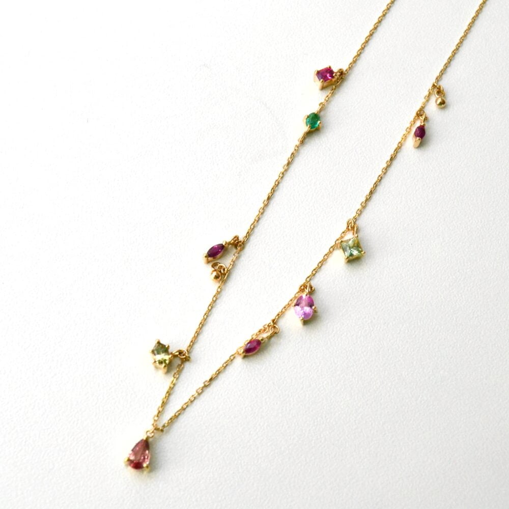 Heirloom necklace with a mix of sapphire, emerald, ruby and diamond