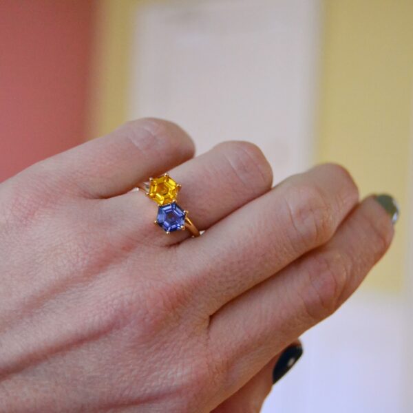Hexagon toi et moi ring with orange and blue sapphire