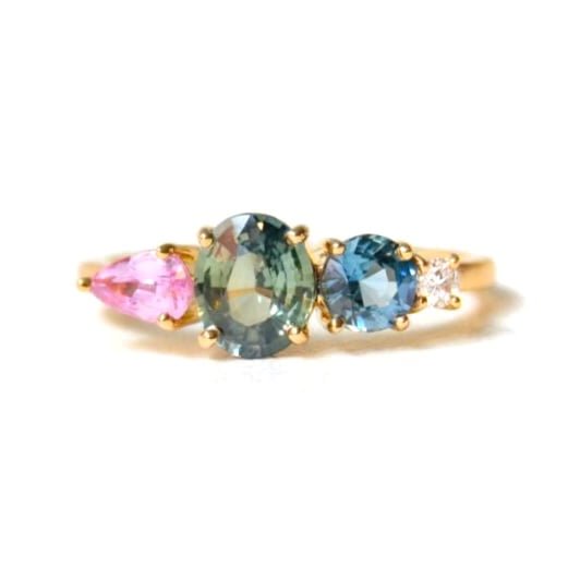 Green sapphire ring with diamonds set in 18k yellow gold