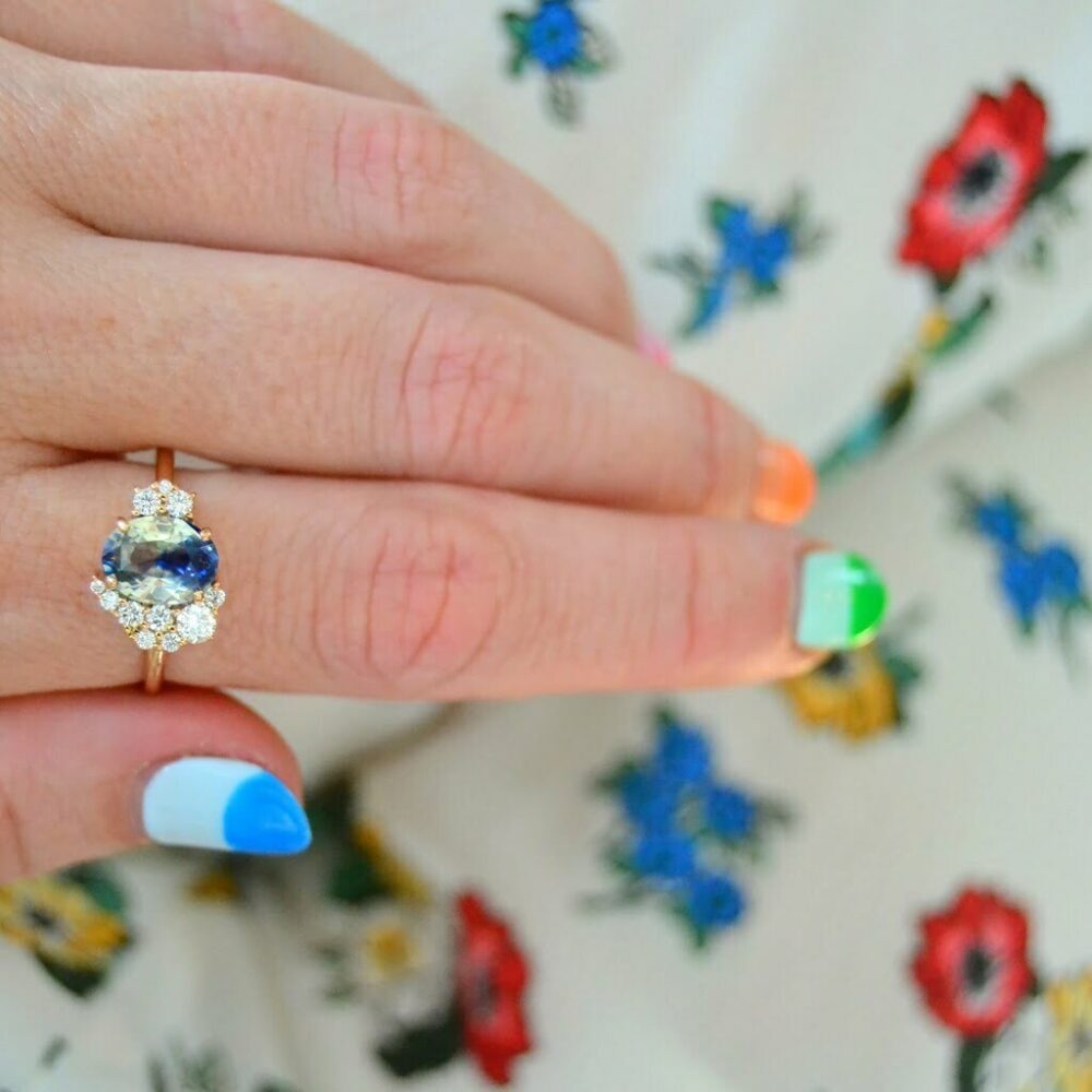 Unheated bi-color sapphire ring with diamonds