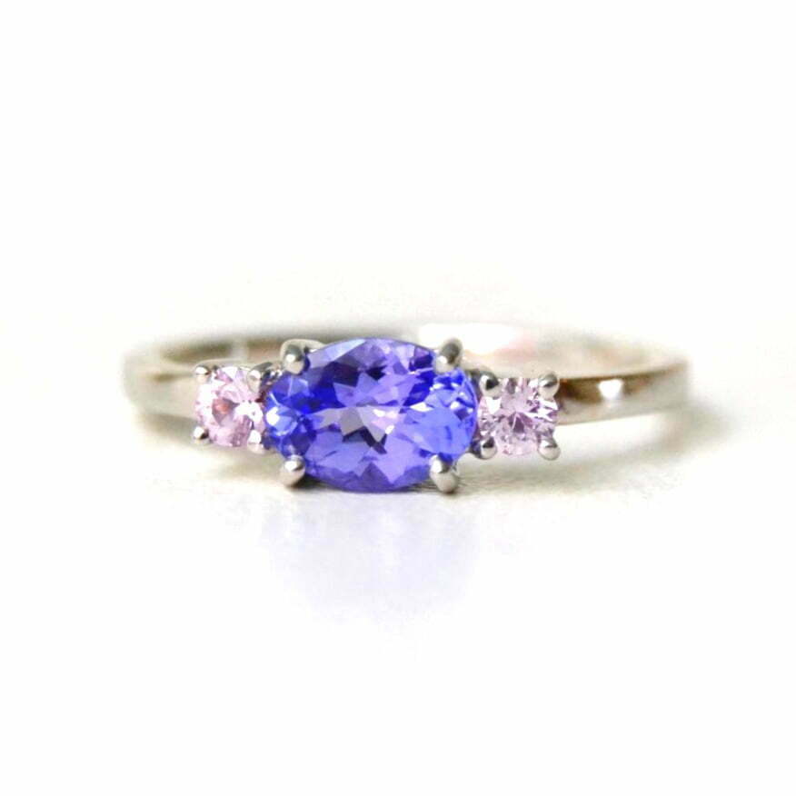 Tanzanite ring With pink sapphires set in 18k white gold