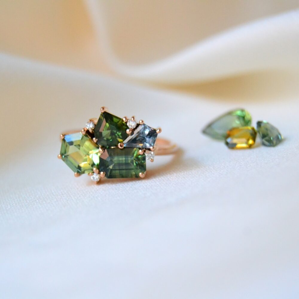 Unheated green and bi-color sapphire cluster ring