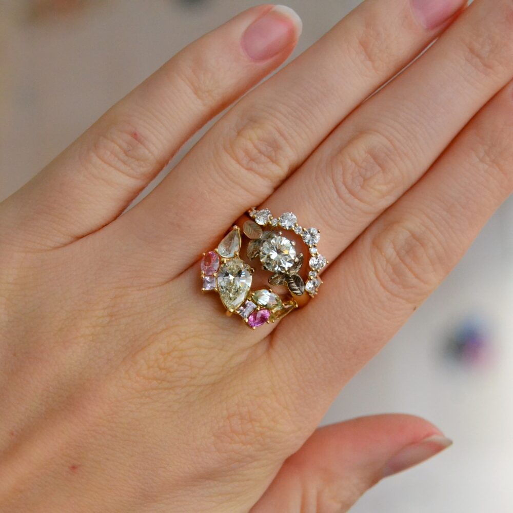 Diamond cluster ring with pastel sapphires