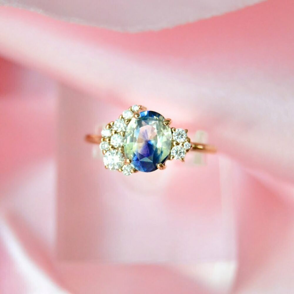 Unheated bi-color sapphire ring with diamonds in rose gold