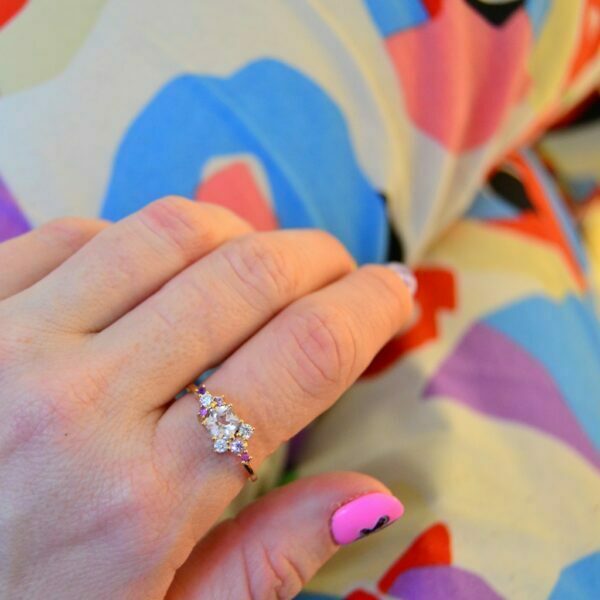 Peach sapphire ring with diamonds