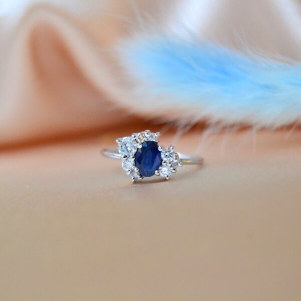 Asymmetric ring with heirloom blue sapphire