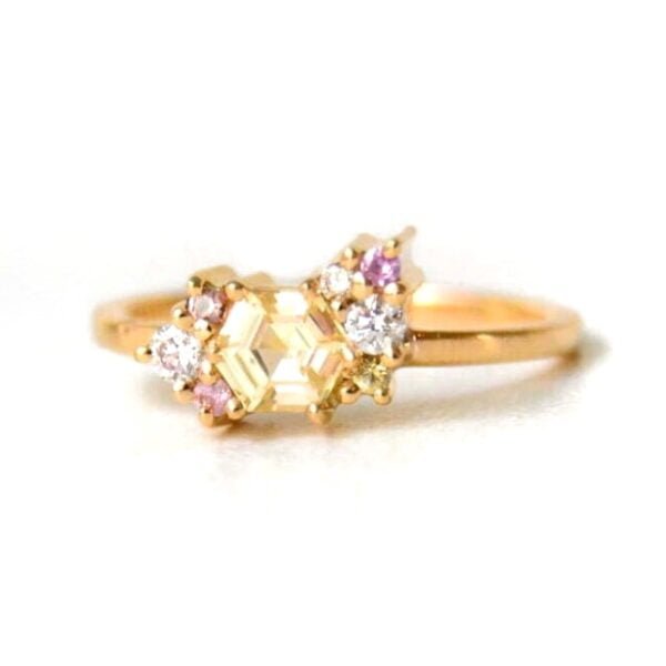 Yellow sapphire ring with diamonds set in 18k yellow gold
