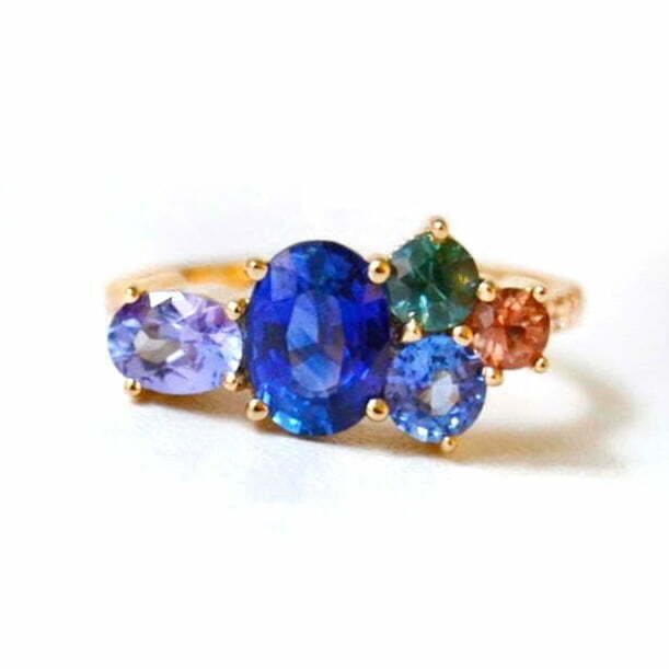 royal blue sapphire ring with tanzanite and diamonds set in 18k yellow gold
