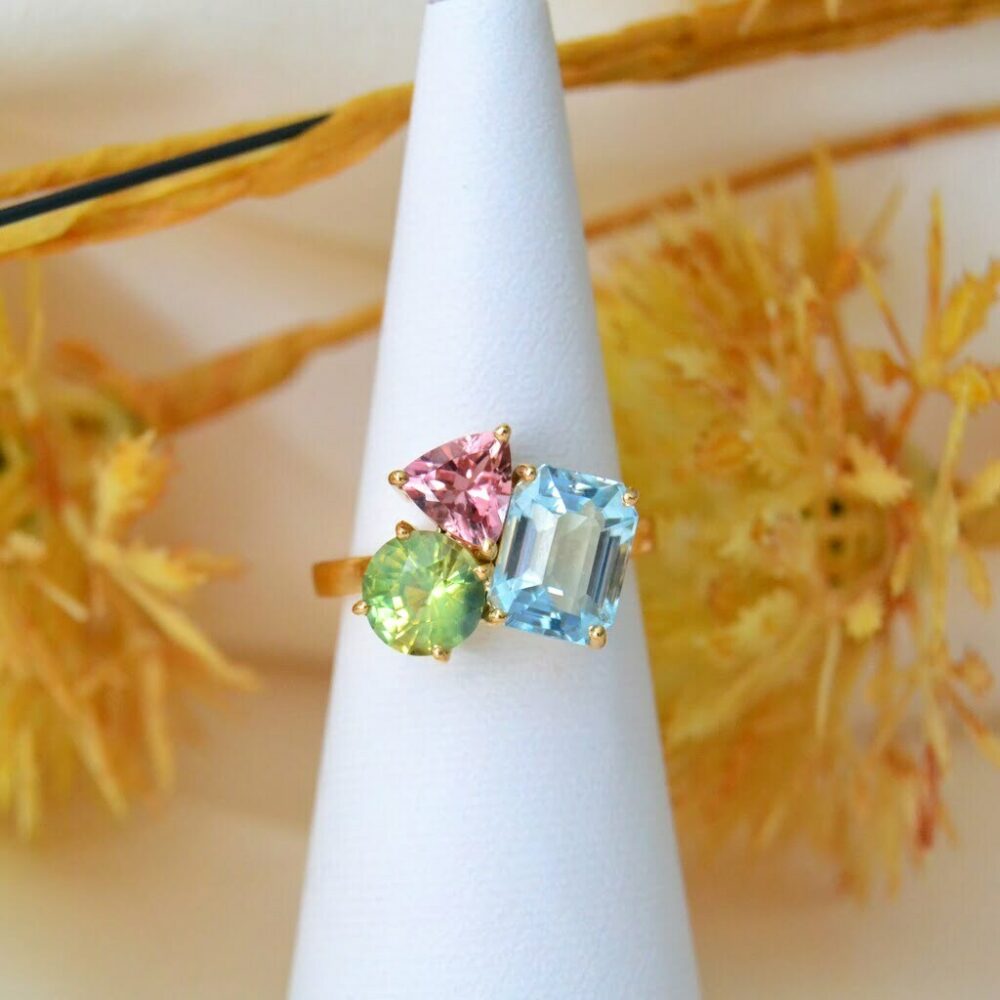 Birthstone cluster ring with family gemstones