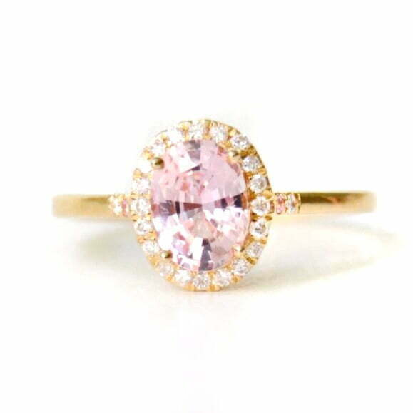 Pink sapphire halo ring with diamonds