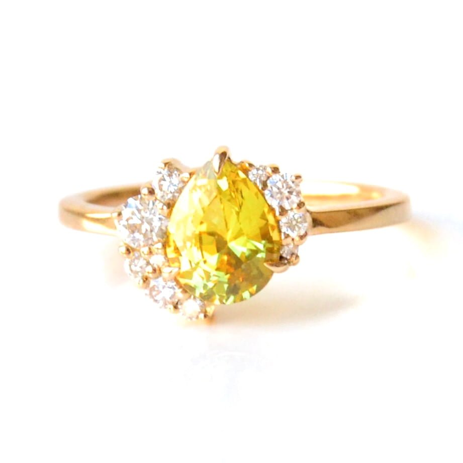 yellow sapphire ring with diamonds set in 18k yellow gold