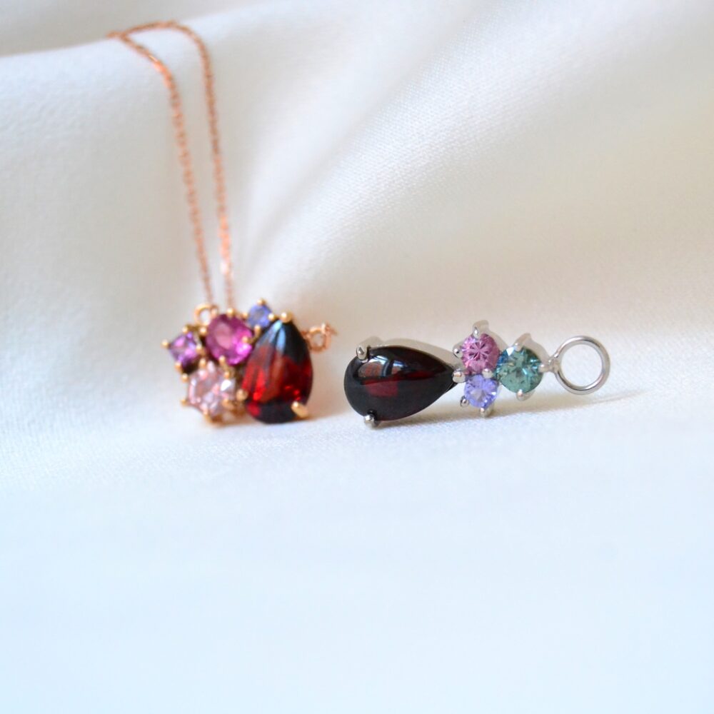 Garnet charms with gems from heirloom jewellery