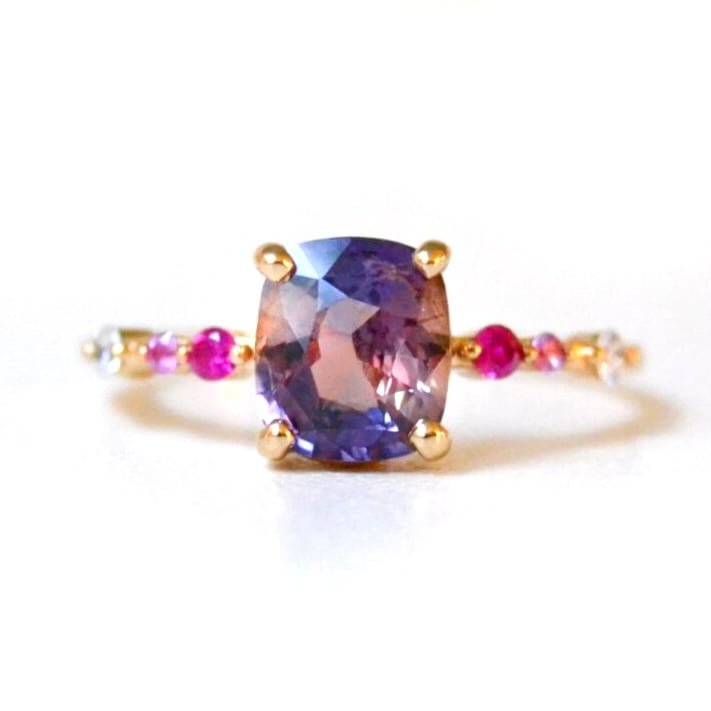 Unheated bi-color sapphire ring with diamonds set in 18k yellow gold