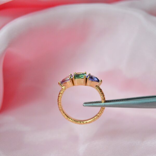 Colorful three stone ring with sapphires