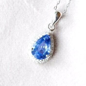 Blue sapphire necklace with diamonds set in 18k white gold