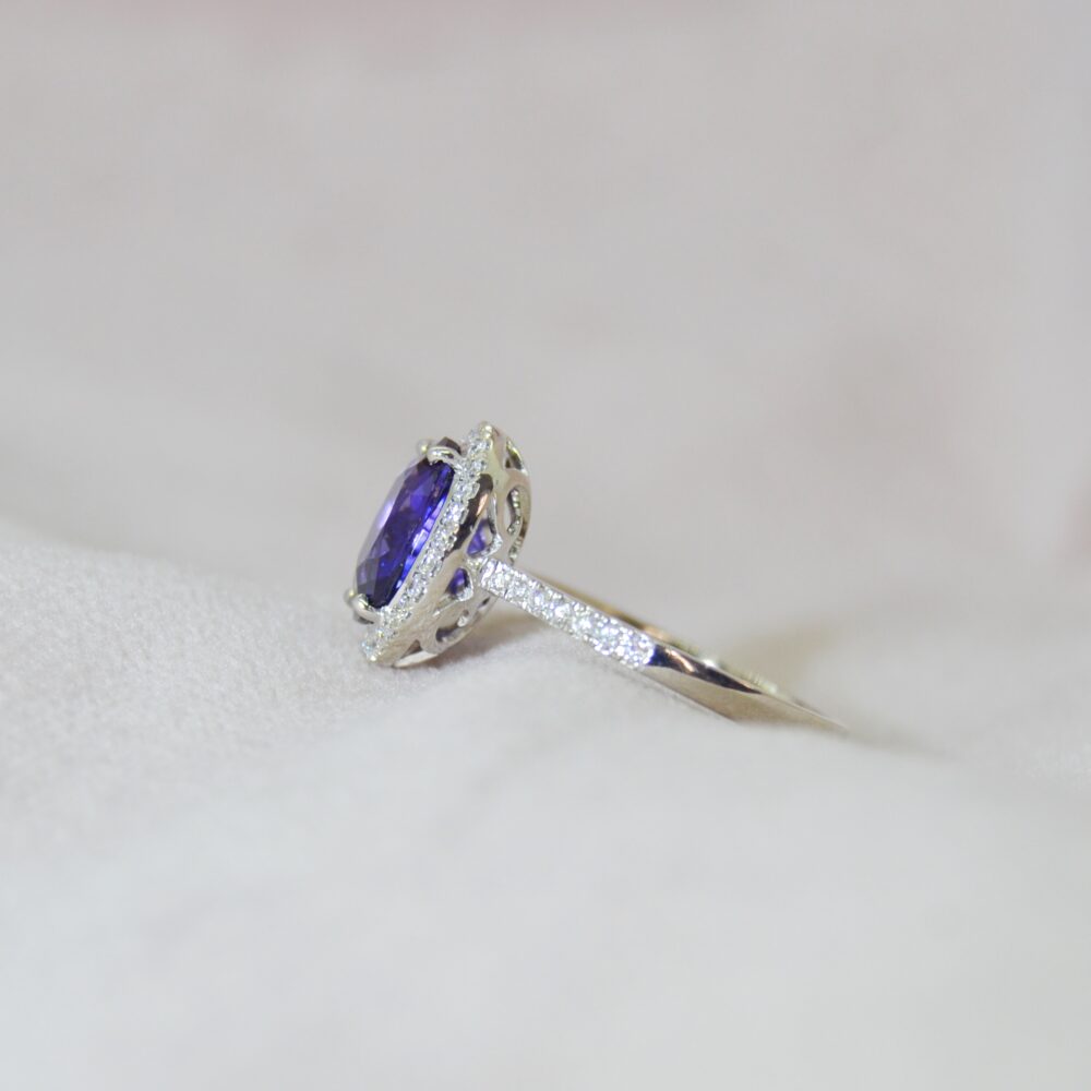 Color changing sapphire ring in a halo design