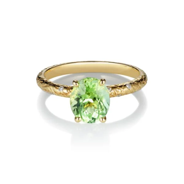 Green tourmaline ring with diamonds set in 18K yellow gold