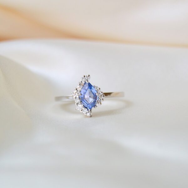Asymmetric light blue sapphire ring