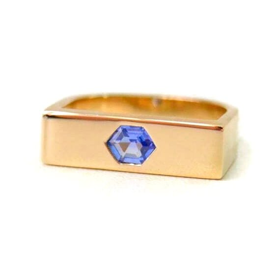 square ring with hexagon blue sapphire set in 14k yellow gold