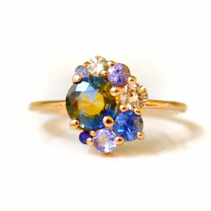 Ring with bi-color sapphire And diamonds set in 18k yellow gold