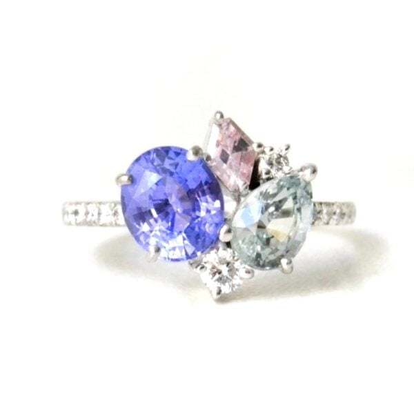 color changing sapphire ring with diamonds set in 18k white gold